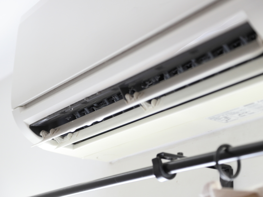 Why is my aircon leaking water from the front?
