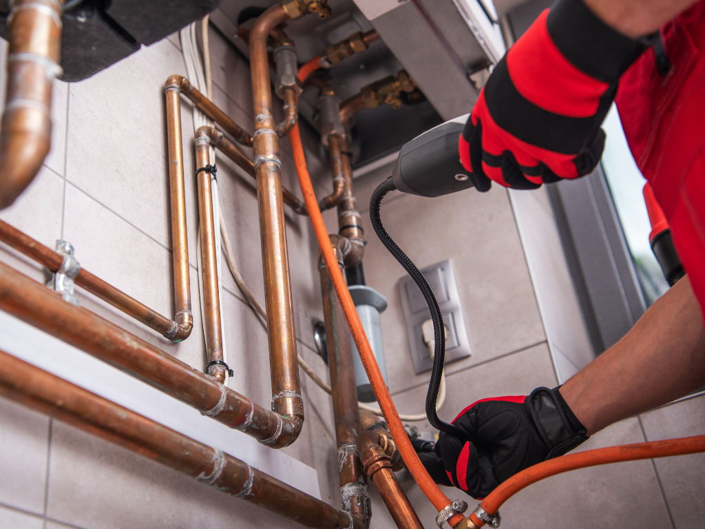Why does oil residue at flare joints mean a gas leak? 
